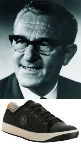 Rudolf Dassler pictured with a model of his namesake shoes